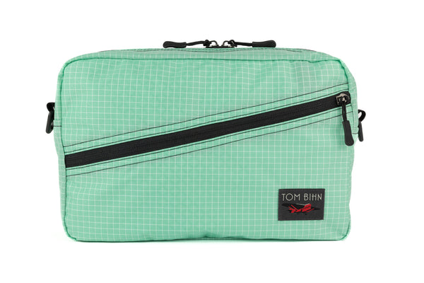 A Packing Cube Shoulder Bag in Seafoam (green with white grid) 200 Halcyon